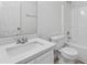 Bright bathroom features a tub, shower, toilet, sink, and vanity with modern finishes at 384 Daniel Mill Xing, Villa Rica, GA 30180