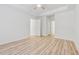 Spacious bedroom boasts tray ceiling, ceiling fan, and sleek flooring at 384 Daniel Mill Xing, Villa Rica, GA 30180