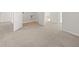 Hallway with carpet that leads to other rooms at 4455 Manor Hill Dr, Union City, GA 30291