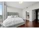Relaxing bedroom with plush carpeting and a view to the ensuite at 1080 Peachtree Ne St # 2710, Atlanta, GA 30309