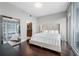 Bright bedroom with modern finishes and floor-to-ceiling windows with reflective decor at 1080 Peachtree Ne St # 2710, Atlanta, GA 30309