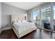Inviting bedroom featuring a balcony and stunning views at 1080 Peachtree Ne St # 2710, Atlanta, GA 30309