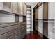 Spacious closet with custom shelving and drawers at 1080 Peachtree Ne St # 2710, Atlanta, GA 30309