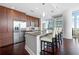 Well-appointed kitchen with modern stainless steel appliances, a spacious island, and sleek cabinetry, perfect for culinary enthusiasts at 1080 Peachtree Ne St # 2710, Atlanta, GA 30309