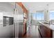 Elegant kitchen featuring stainless steel appliances, granite countertops, and seamless transition to a well lit living area at 1080 Peachtree Ne St # 2710, Atlanta, GA 30309
