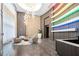 Elegant lobby area with decorative lighting, lounge chairs, and sleek flooring at 1080 Peachtree Ne St # 2710, Atlanta, GA 30309