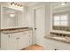 Elegant bathroom with dual vanities, granite countertops, and neutral flooring at 4045 Boles Creek Dr, Duluth, GA 30096