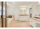 Luxurious bathroom with soaking tub, granite countertops, and dual vanities at 4045 Boles Creek Dr, Duluth, GA 30096