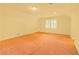 Bright bonus room with unfinished floors and natural light, ready to be transformed at 4045 Boles Creek Dr, Duluth, GA 30096