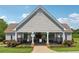 Community clubhouse with well-manicured landscaping, providing a welcoming space for residents at 4369 Milford Pl, Hoschton, GA 30548