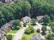 A beautiful aerial view of a home nestled in a lush, green neighborhood at 1630 Reindeer Rdg, Alpharetta, GA 30005
