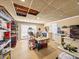 Unfinished basement with storage shelves, walkout access, and a workbench area, offering ample space at 1630 Reindeer Rdg, Alpharetta, GA 30005