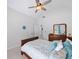 Light-filled bedroom with vaulted ceiling, ceiling fan, and decor at 1630 Reindeer Rdg, Alpharetta, GA 30005