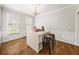 Sunlit dining room with crown molding and a neutral color palette at 1630 Reindeer Rdg, Alpharetta, GA 30005
