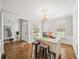 Bright dining room with hardwood floors and ample natural light at 1630 Reindeer Rdg, Alpharetta, GA 30005