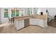 Eat-in kitchen with stone countertops, stainless steel appliances, and tiled floors at 1630 Reindeer Rdg, Alpharetta, GA 30005