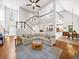 Open-concept living room with high ceilings and a view of the staircase at 1630 Reindeer Rdg, Alpharetta, GA 30005