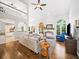 Spacious living room with hardwood floors and a cozy fireplace at 1630 Reindeer Rdg, Alpharetta, GA 30005