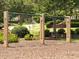 Community playground featuring swings and lush landscaping, perfect for Gathering fun at 1630 Reindeer Rdg, Alpharetta, GA 30005