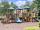 Community playground featuring a large wooden play structure with slides and climbing areas at 1630 Reindeer Rdg, Alpharetta, GA 30005