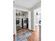 Laundry room featuring a washer, dryer, and storage shelves for supplies at 5990 Eagle Tiff Ln, Sugar Hill, GA 30518