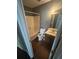 Cozy bathroom features a vanity with a sink and a shower/tub combo at 6470 Bedford Ln, Lithonia, GA 30058