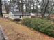 View of a backyard with mature trees and foliage creating a private retreat at 1088 Palafox Ne Dr, Atlanta, GA 30324
