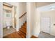 Staircase next to bathroom featuring wood stairs and a shower with glass door at 226 Euharlee Five Forks Rd, Kingston, GA 30145