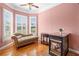 Comfortable sitting area with hardwood floors, bay window, chaise lounge, and fireplace at 226 Euharlee Five Forks Rd, Kingston, GA 30145