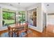 Bright dining area features large windows with a view of the backyard at 226 Euharlee Five Forks Rd, Kingston, GA 30145