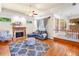 Inviting living room with hardwood floors, fireplace, plenty of seating and access to the dining room at 226 Euharlee Five Forks Rd, Kingston, GA 30145