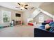 Bright bonus room offering a comfortable seating area, fun colors, and lots of space at 325 Stonecastle Sw Pass, Atlanta, GA 30331