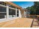 Wood deck with railing on a sunny day at 325 Stonecastle Sw Pass, Atlanta, GA 30331