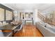 Elegant dining area with hardwood floors, modern lighting, and stylish furniture at 196 Mystic Ct, Atlanta, GA 30342