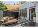 Cozy patio with outdoor seating, a dining area, and a shade sail for sun protection at 196 Mystic Ct, Atlanta, GA 30342
