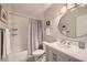 Bright bathroom featuring a shower/tub combination and vanity at 3440 Ashwood Ln, Atlanta, GA 30341