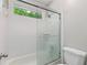 Bathroom shower/tub combination showcasing white subway tiles and modern fixtures at 836 Saint Charles Ne Ave # I, Atlanta, GA 30306