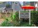 Elegant community sign for The Courtyards, showcasing its prime location at 836 St. Charles Avenue with lush surroundings at 836 Saint Charles Ne Ave # I, Atlanta, GA 30306