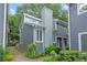 Charming gray two-story home with landscaped yard and inviting walkway leading to the entrance at 836 Saint Charles Ne Ave # I, Atlanta, GA 30306