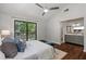 Inviting main bedroom with balcony access and ensuite bathroom boasts modern comfort and style at 836 Saint Charles Ne Ave # I, Atlanta, GA 30306