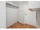 Functional laundry room is ready for washer dryer hookups with wood-look flooring at 4820 Scott Rd, Cumming, GA 30041