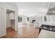 Spacious open floor plan, wood flooring, cozy fireplace and modern design at 4820 Scott Rd, Cumming, GA 30041