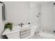 Elegant bathroom with freestanding tub and glass-enclosed shower featuring white subway tile at 6930 Whitman Walk, Alpharetta, GA 30005