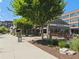 Charming brewpub exterior with outdoor seating, nestled among trees, creating a cozy and inviting atmosphere at 6930 Whitman Walk, Alpharetta, GA 30005