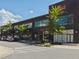Multi-tenant commercial building with attractive landscaping and ample parking at 6930 Whitman Walk, Alpharetta, GA 30005