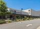 Modern CMX Cinebistro cinema with outdoor seating and a sleek facade at 6930 Whitman Walk, Alpharetta, GA 30005