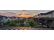 Picturesque community homes with beautiful landscaping at sunset at 6930 Whitman Walk, Alpharetta, GA 30005