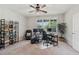 Bright office space with neutral walls, a ceiling fan, large window, and ample workspace at 6930 Whitman Walk, Alpharetta, GA 30005
