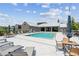 Community pool with ample seating, perfect for relaxation and summer fun at 6930 Whitman Walk, Alpharetta, GA 30005