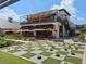 Outdoor space with a checkers game and HobNob Tavern in the background at 6930 Whitman Walk, Alpharetta, GA 30005